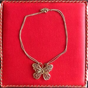 Butterfly necklace, golden colored, double skinny chain.